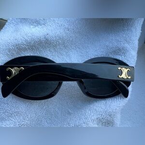 Black Sunglasses with Gold Accents